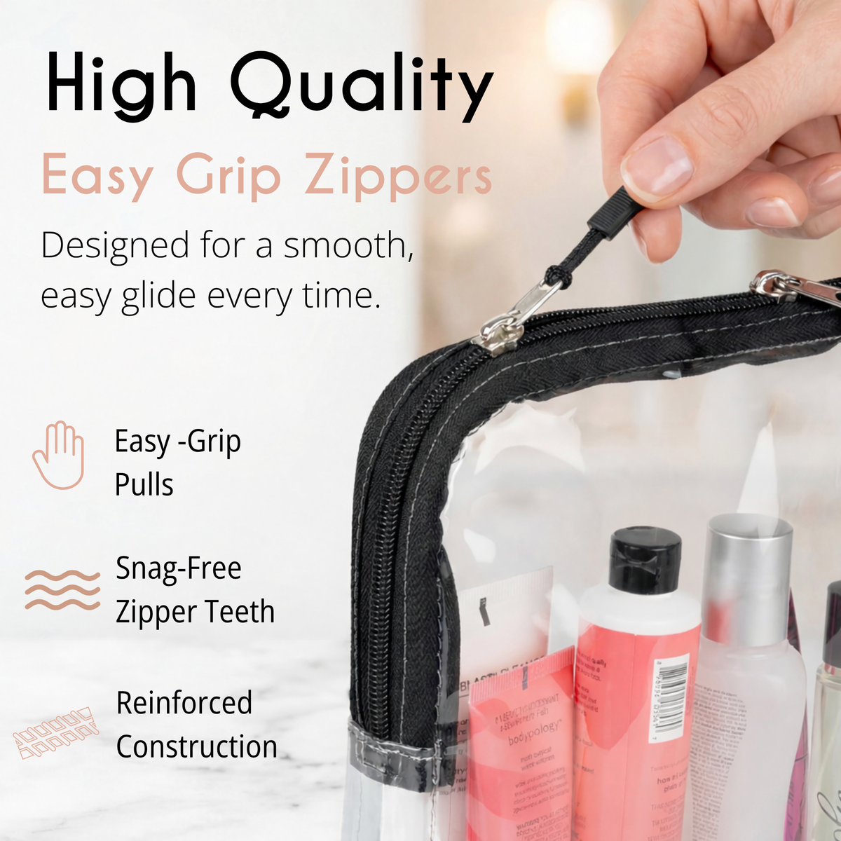 person holding zipper of tsa bag showing features of zipper and bag