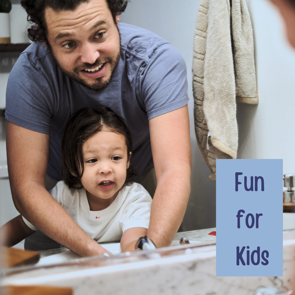 dad and daughter washing their hands