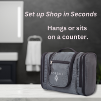 hanging toiletry bag closed an siting on a counter