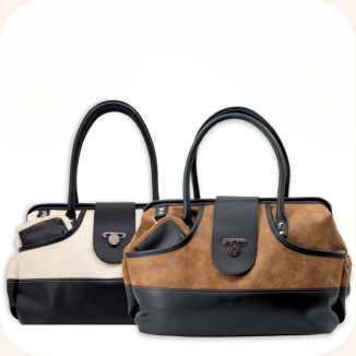 Two leather shoulder bags shown against a white background with a soft drop shadow. The front bag is brown and black, and the bag behind it is cream and black.